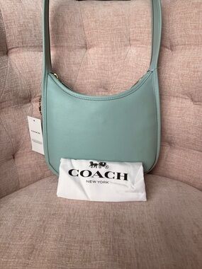 COACH Curve Zip Bag - Light Blue